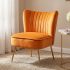 Notre test du chairus, fauteuil scandinave en velours bleu à pieds dorés